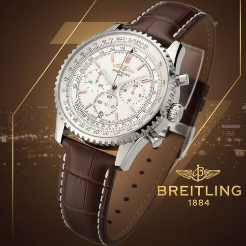 Designer Watch With a Silver Dial and Brown Leather Strap